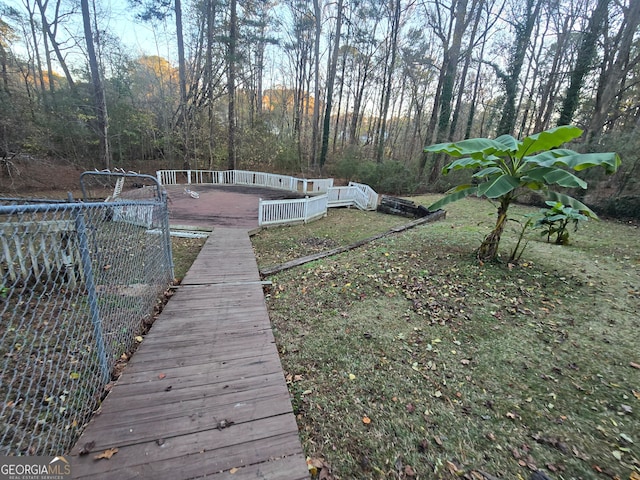 view of yard featuring a wooden deck