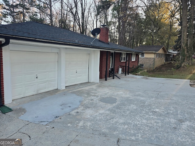 single story home featuring a garage