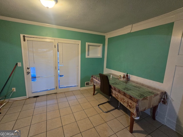 interior space with crown molding, light tile patterned floors, and a textured ceiling