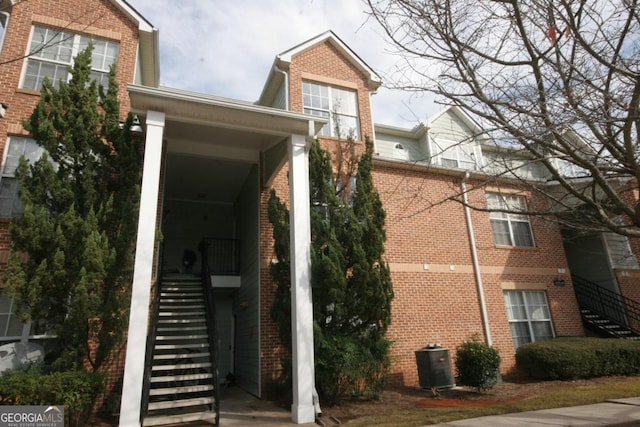 exterior space featuring central AC unit