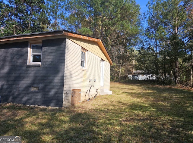 view of property exterior featuring a yard