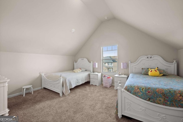 carpeted bedroom featuring lofted ceiling