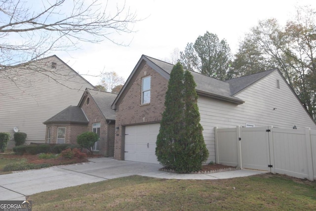 view of home's exterior featuring a yard