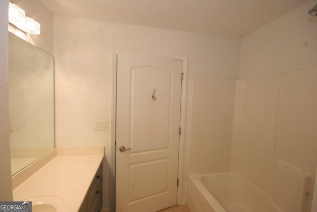 bathroom featuring vanity and tub / shower combination