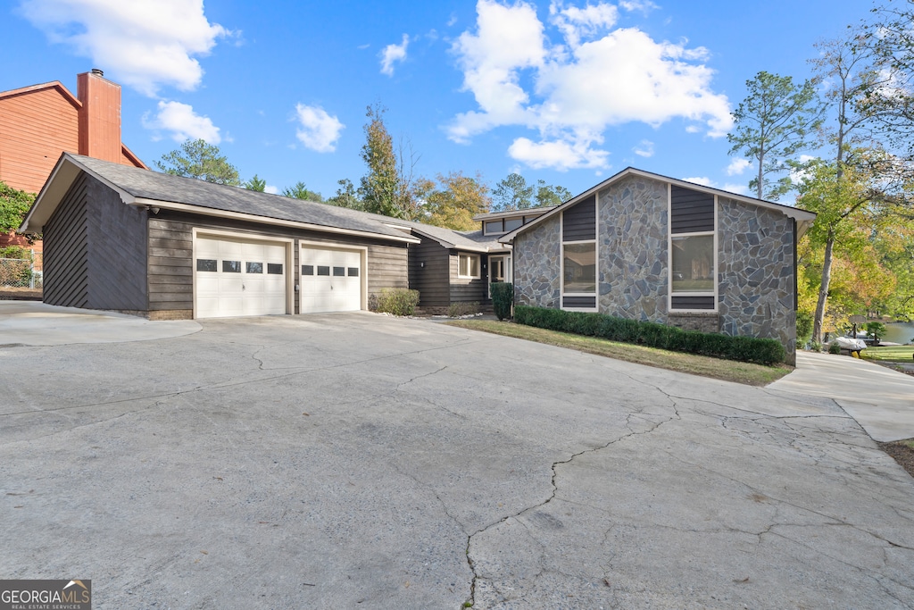 view of front of property with a garage