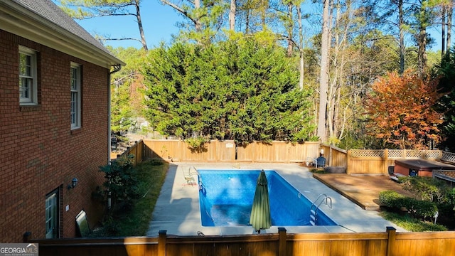 view of pool featuring a patio area