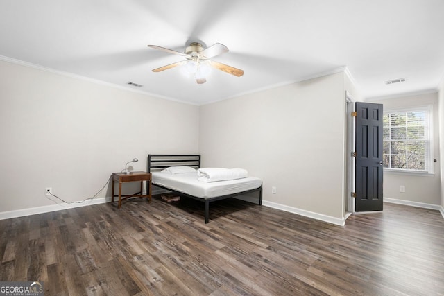 bedroom with ceiling fan, crown molding, and dark hardwood / wood-style floors