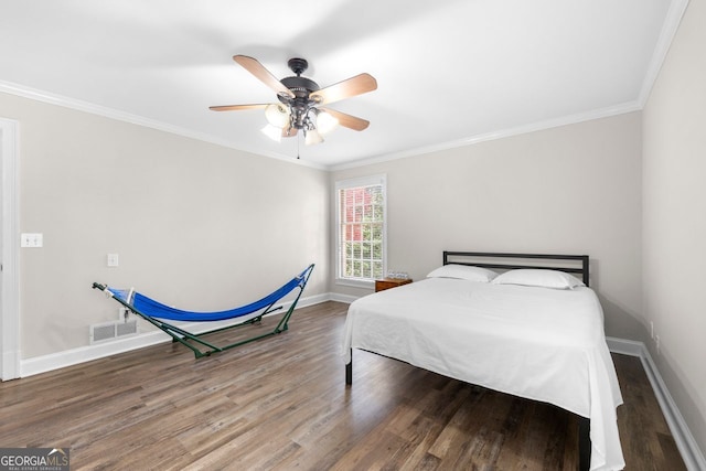 bedroom with ceiling fan, wood-type flooring, and ornamental molding