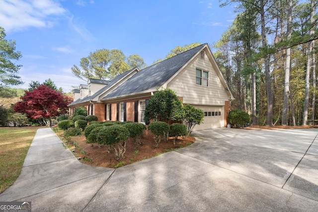 view of side of property featuring a garage