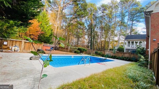 view of pool featuring a patio area