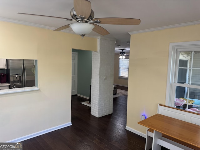 interior space with dark hardwood / wood-style floors and ornamental molding