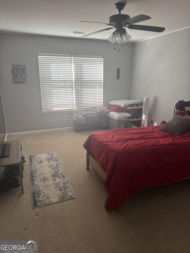 bedroom with carpet and ceiling fan