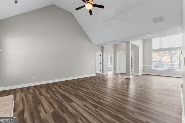 unfurnished living room featuring ceiling fan, dark wood-type flooring, and high vaulted ceiling