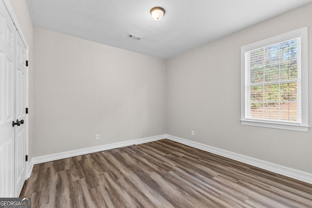 empty room featuring hardwood / wood-style floors