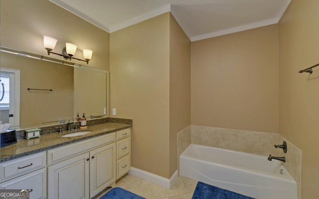 bathroom featuring tile patterned floors, crown molding, a washtub, and vanity