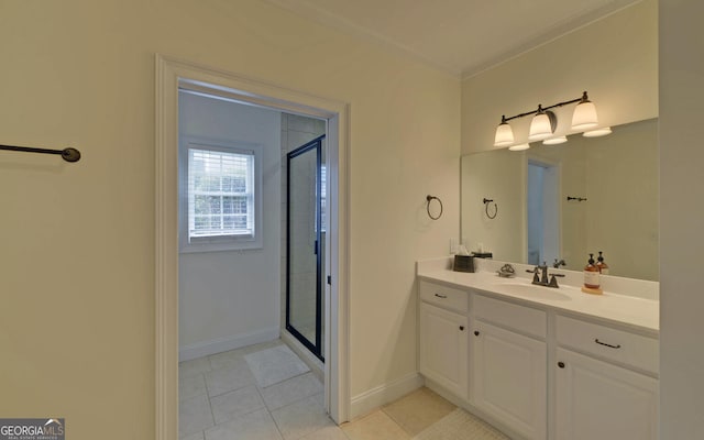 bathroom with tile patterned flooring, vanity, and a shower with shower door