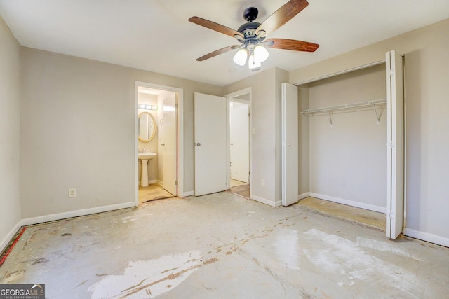 5267 Tasman Trl, Lithonia, GA 30038 - unfurnished bedroom with a sink, a closet, ensuite bathroom, and ceiling fan