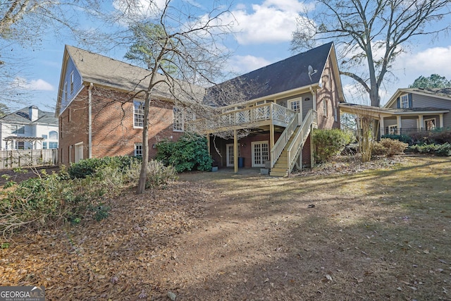 rear view of house with a deck