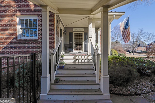 doorway to property with a porch