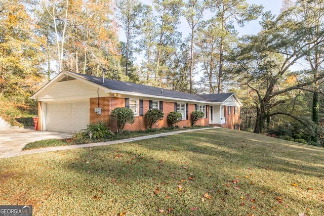 ranch-style home with a garage and a front lawn