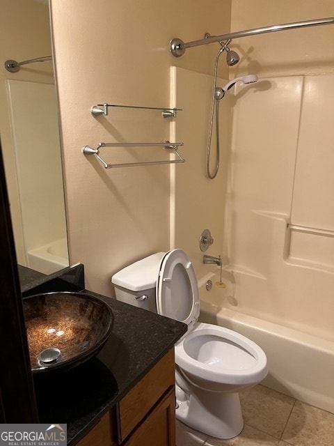 full bathroom featuring vanity, tile patterned flooring, shower / bathing tub combination, and toilet