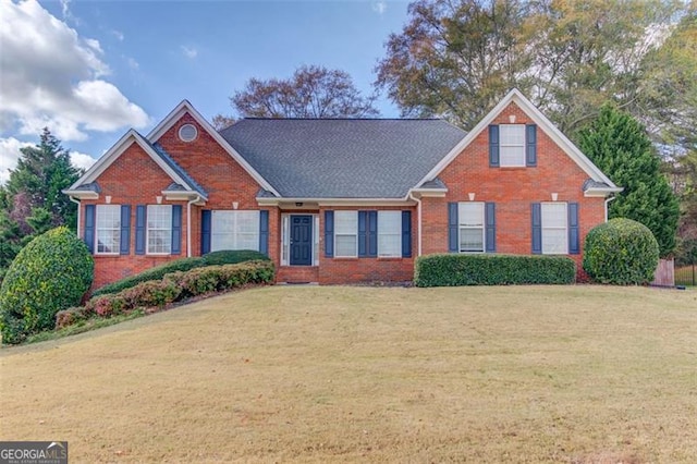 view of front facade with a front lawn