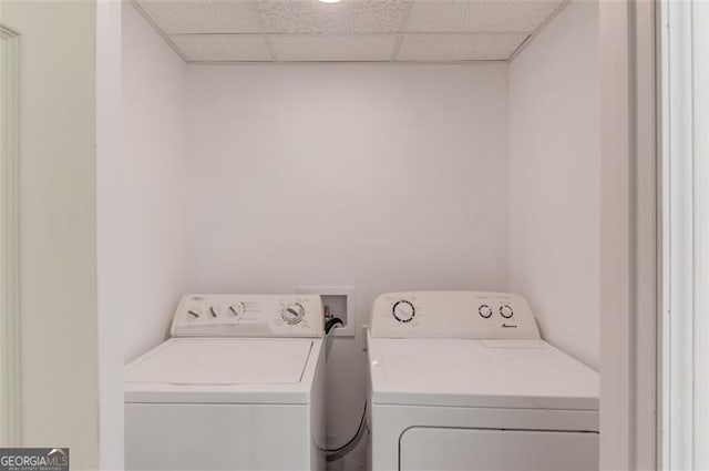 laundry area featuring washing machine and clothes dryer