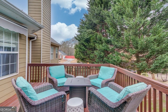 deck featuring an outdoor hangout area