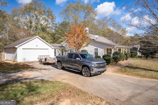 view of side of property with a garage