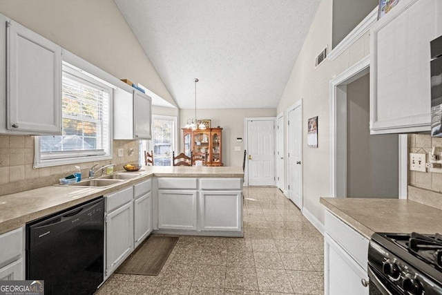 kitchen with white cabinetry, sink, hanging light fixtures, vaulted ceiling, and black appliances