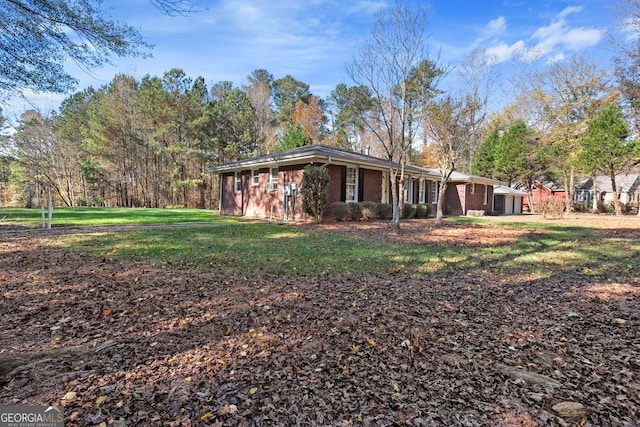 view of home's exterior featuring a lawn