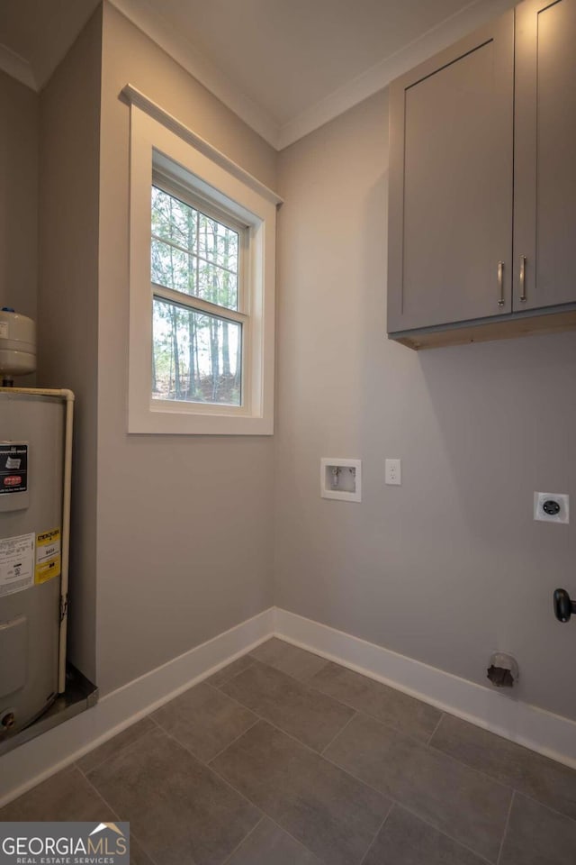 washroom with cabinets, washer hookup, electric dryer hookup, electric water heater, and ornamental molding