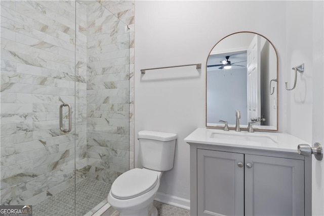 bathroom with walk in shower, vanity, toilet, and ceiling fan