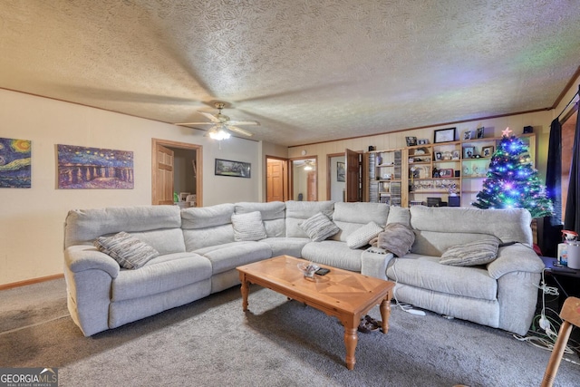 carpeted living room featuring a textured ceiling, ceiling fan, and ornamental molding