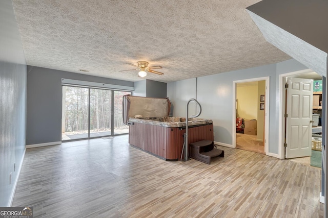 kitchen featuring light hardwood / wood-style floors and ceiling fan