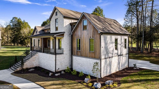 view of home's exterior with a lawn