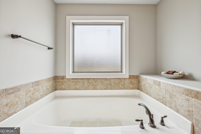 bathroom featuring a washtub