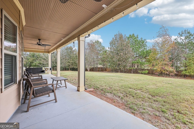 view of patio with ceiling fan