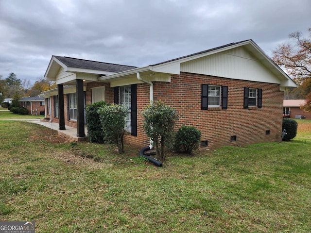 view of property exterior featuring a yard