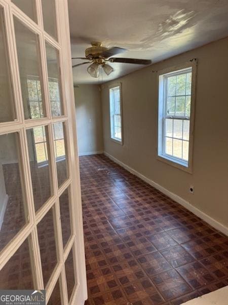 spare room featuring ceiling fan