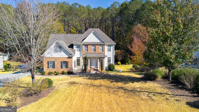 view of front of home with a front lawn