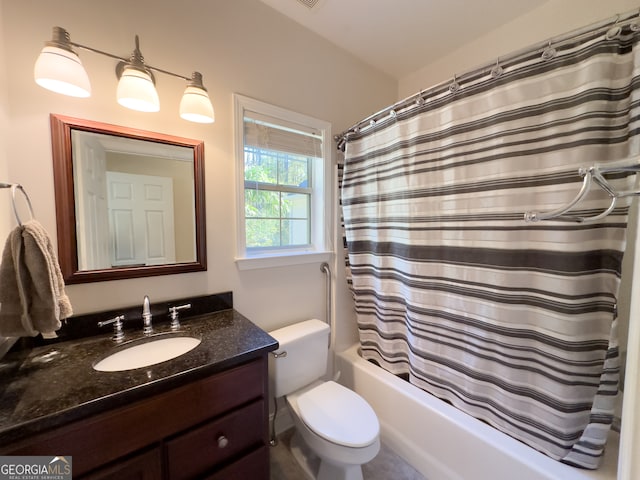 full bathroom featuring vanity, toilet, and shower / bath combo with shower curtain