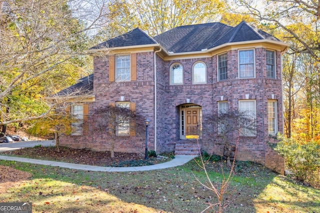 view of front of home with a front lawn