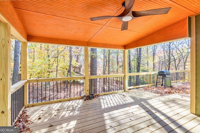 deck with ceiling fan and a grill