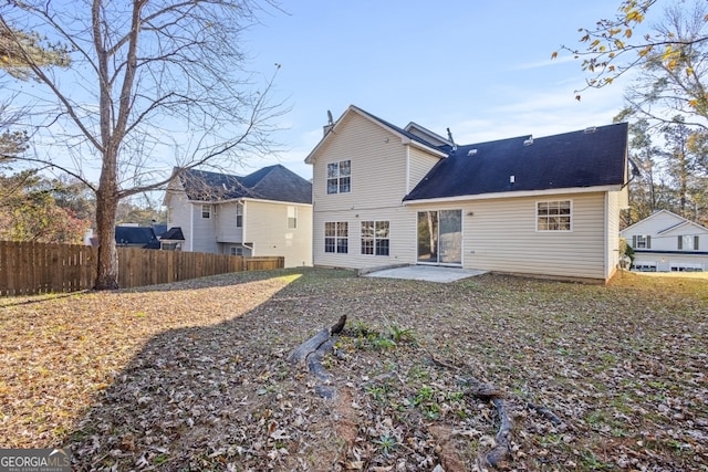 rear view of house featuring a patio area