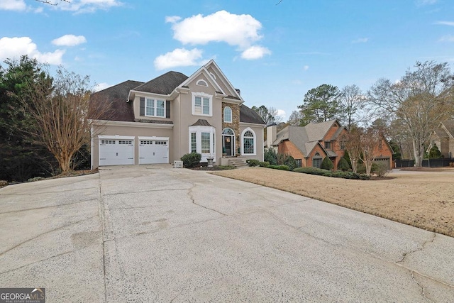 front of property with a garage