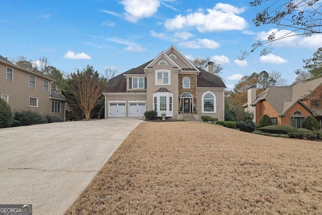 front of property with a garage