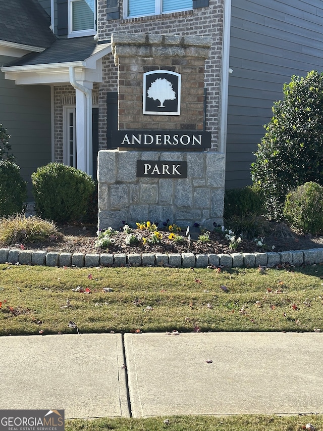 view of community sign