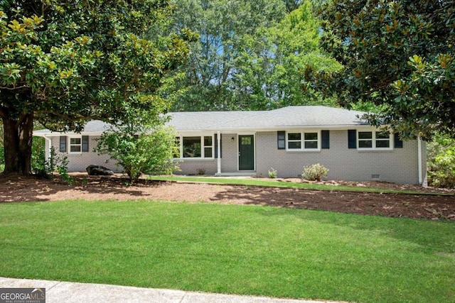 ranch-style house with a front lawn