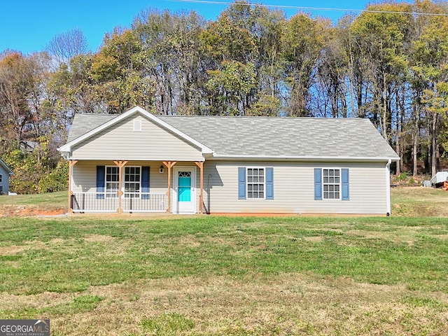 single story home with a porch and a front lawn